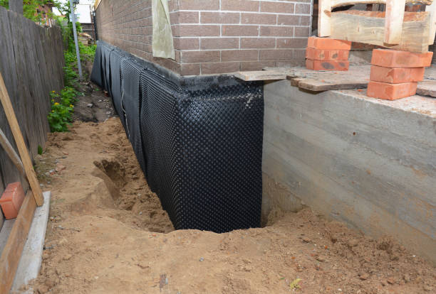 Happy homeowners after waterproofing job in Shrewsbury